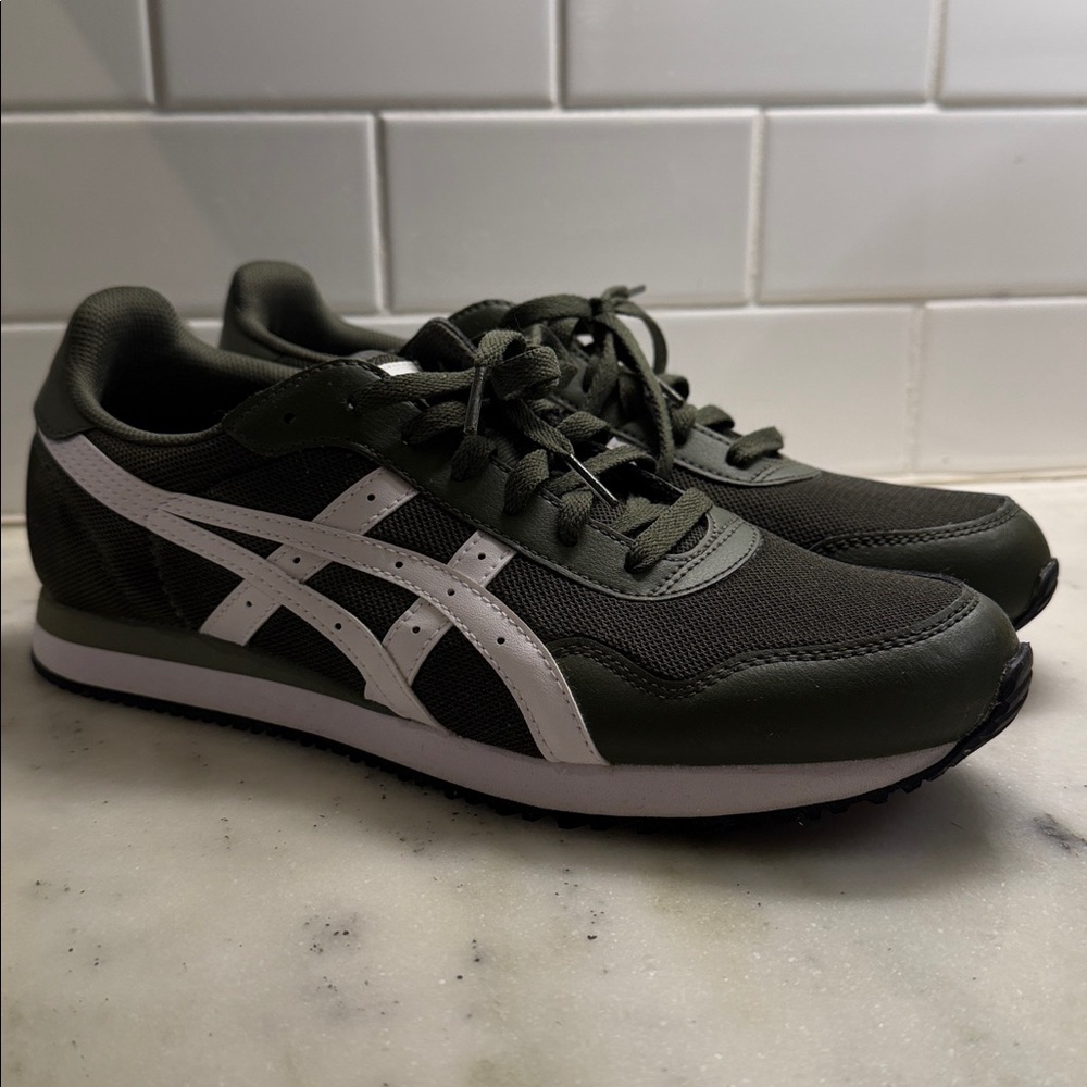 ASICS Olive Green. Size 9.5. Worn once and
 in excellent condition.
